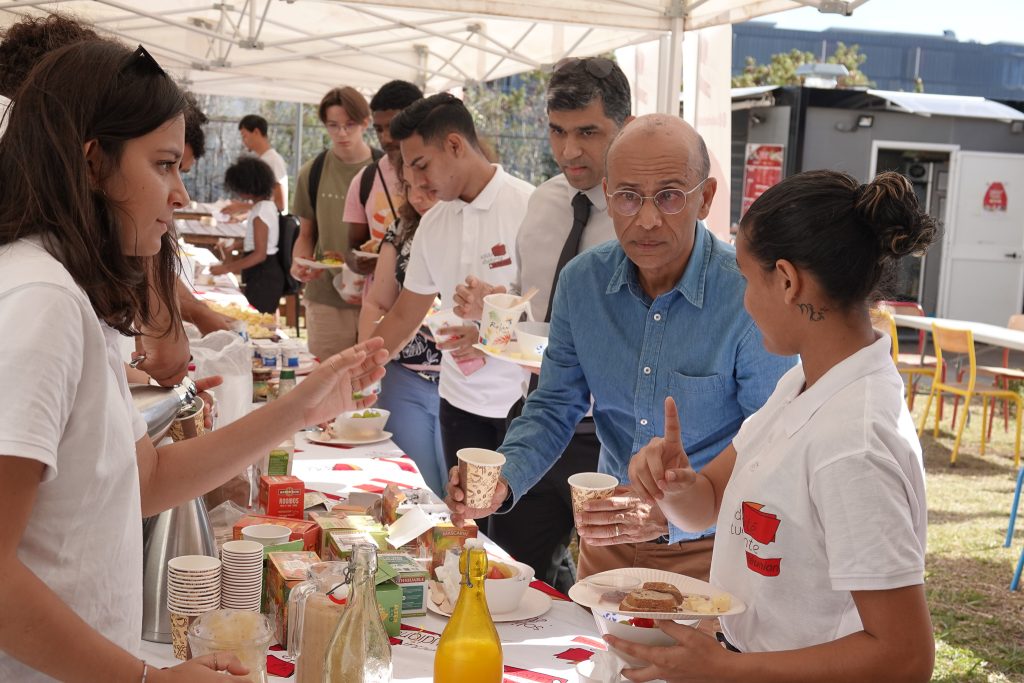 Mr. MIRANVILLE, President of the University, and Mr. NAILLET, Member of Parliament enjoying breakfast